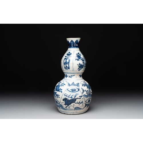 187 - A Chinese blue and white 'flying horse' double gourd vase, WanliH.: 28 cm
 Provenance: - A Danish pr... 