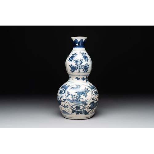 187 - A Chinese blue and white 'flying horse' double gourd vase, WanliH.: 28 cm
 Provenance: - A Danish pr... 