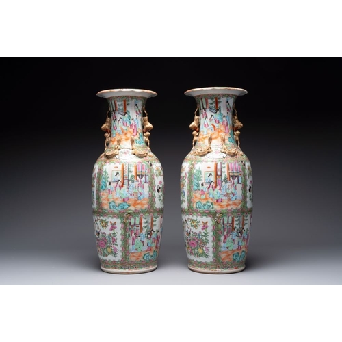 28 - A pair of Chinese Canton famille rose vases with narrative design, 19th C.H.: 62 cm 