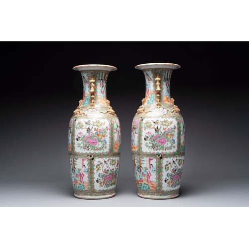 28 - A pair of Chinese Canton famille rose vases with narrative design, 19th C.H.: 62 cm 