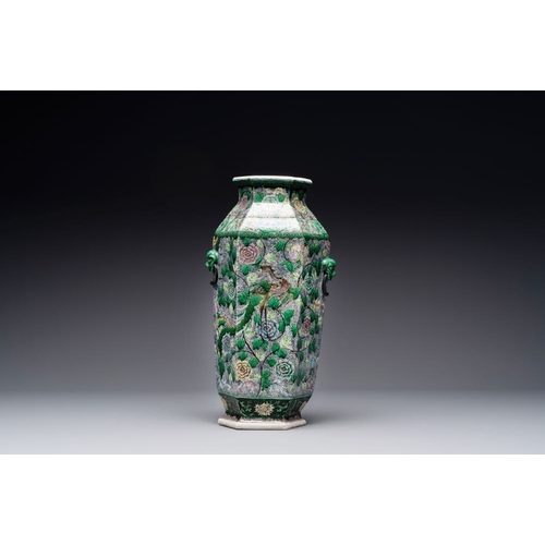 43 - A Chinese verte biscuit hexagonal 'phoenix and flower scroll' vase, 19th C.H.: 40,5 cm 