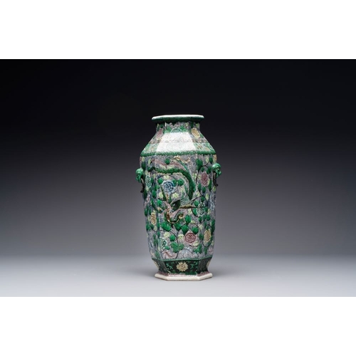 43 - A Chinese verte biscuit hexagonal 'phoenix and flower scroll' vase, 19th C.H.: 40,5 cm 