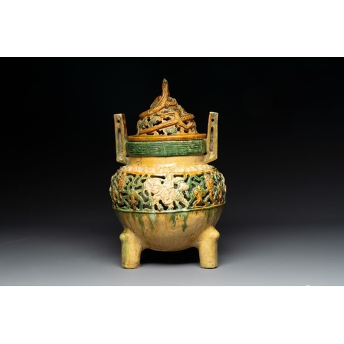 50 - A Chinese sancai-glazed reticulated double-walled tripod censer and cover, MingH.: 35 cm
 Provenance... 