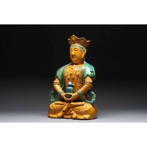 52 - A large Chinese sancai-glazed Buddha, possibly from the Chengde Palace, QianlongH.: 56 cm... 