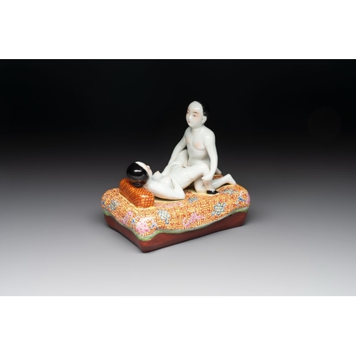 62 - A Chinese famille rose 'erotic' group, You Lin Ji Zao mark, 20th C.Dim.: 17 x 11 x 18 cm