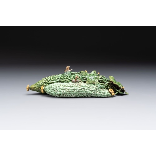 69 - Two Chinese polychrome groups of cucumbers and bitter melons with insects, 19/20th C.L.: 31 cm (the ... 