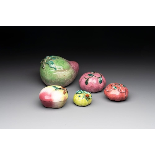 70 - A collection of five Chinese famille rose peaches and pumpkins, including a box and cover, 19th C.Di... 