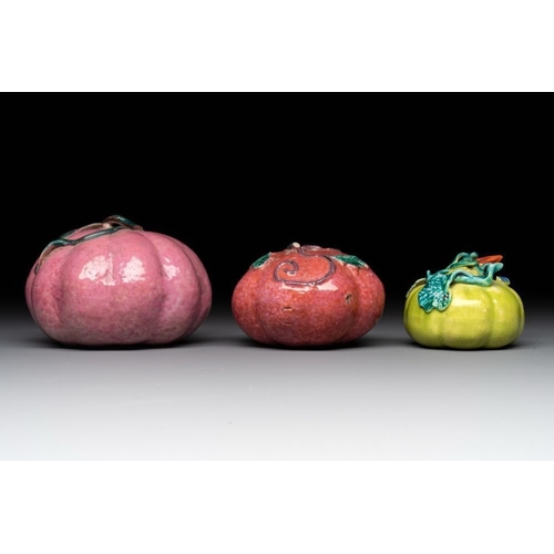 70 - A collection of five Chinese famille rose peaches and pumpkins, including a box and cover, 19th C.Di... 