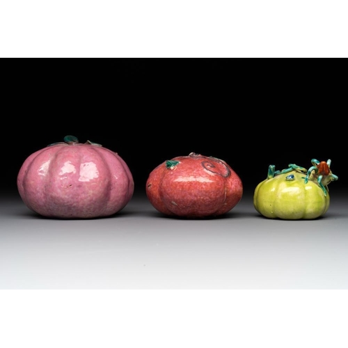 70 - A collection of five Chinese famille rose peaches and pumpkins, including a box and cover, 19th C.Di... 