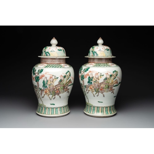 81 - A pair of famille verte-style 'warriors on horseback' vases and covers, Samson, Paris, 19th C.H.: 45... 