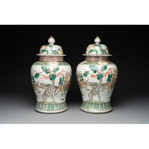 81 - A pair of famille verte-style 'warriors on horseback' vases and covers, Samson, Paris, 19th C.H.: 45... 