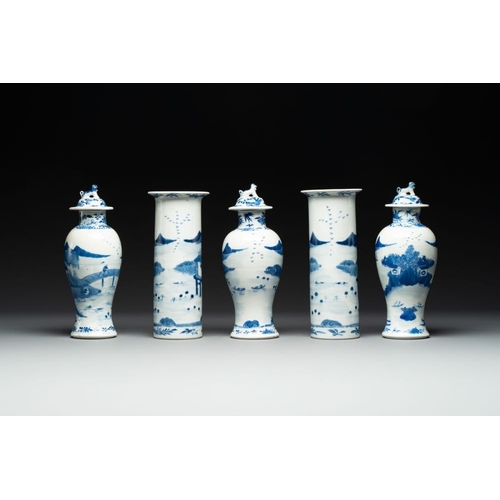 9 - A Chinese blue and white garniture of five vases with river landscapes, 19th C.H.: 27,5 cm (the cove... 