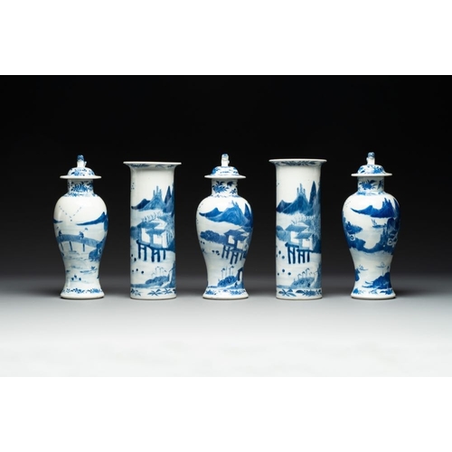 9 - A Chinese blue and white garniture of five vases with river landscapes, 19th C.H.: 27,5 cm (the cove... 