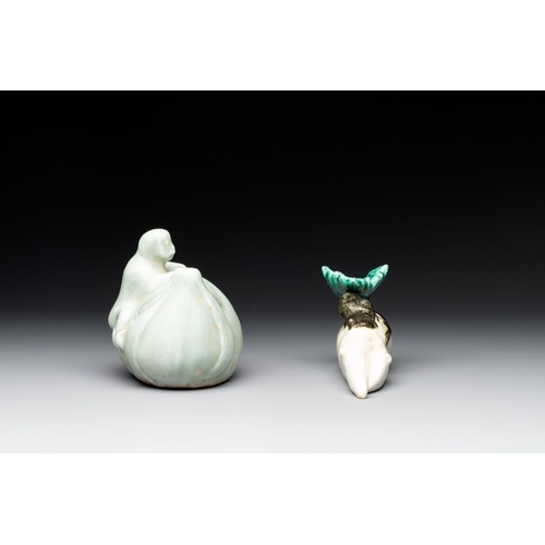 93 - A Chinese celadon-glazed water dropper, a yellow-glazed ewer, a famille noire covered vase and a min... 