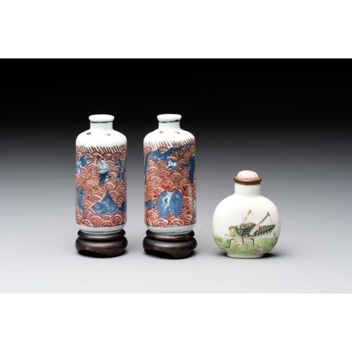 97 - A pair of Chinese blue, white and copper-red 'mythical beasts' and a famille rose 'grasshopper' snuf... 