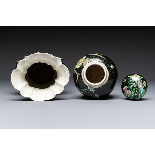 14 - A Chinese verte biscuit black-ground vase and a covered jar, Xuande and Kangxi mark, 19th C.H.: 31,6... 