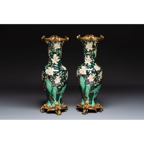 15 - A massive pair of gilt-bronze-mounted famille noire style vases, Samson, Paris, 19th C.H.: 85,5 cm (... 