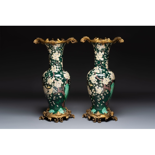 15 - A massive pair of gilt-bronze-mounted famille noire style vases, Samson, Paris, 19th C.H.: 85,5 cm (... 