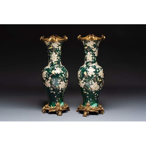 15 - A massive pair of gilt-bronze-mounted famille noire style vases, Samson, Paris, 19th C.H.: 85,5 cm (... 