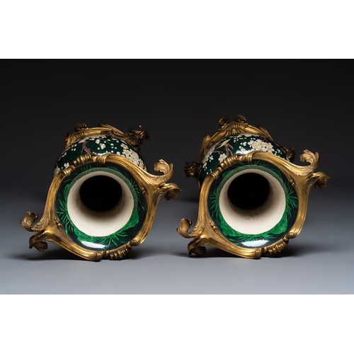 15 - A massive pair of gilt-bronze-mounted famille noire style vases, Samson, Paris, 19th C.H.: 85,5 cm (... 