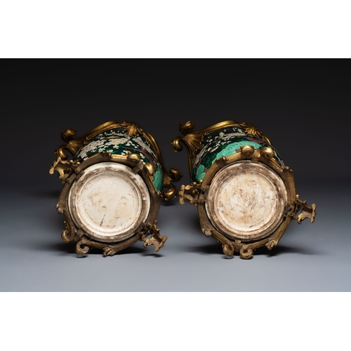 15 - A massive pair of gilt-bronze-mounted famille noire style vases, Samson, Paris, 19th C.H.: 85,5 cm (... 