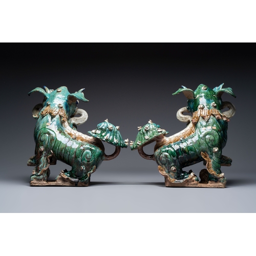 17 - A pair of large Chinese polychrome-glazed Shiwan stoneware Buddhist lions, 19th C.Dim.: 44 x 47 x 29... 