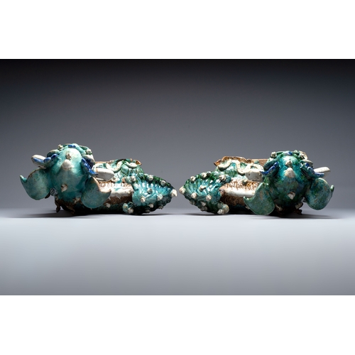 17 - A pair of large Chinese polychrome-glazed Shiwan stoneware Buddhist lions, 19th C.Dim.: 44 x 47 x 29... 