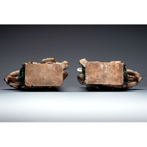 17 - A pair of large Chinese polychrome-glazed Shiwan stoneware Buddhist lions, 19th C.Dim.: 44 x 47 x 29... 