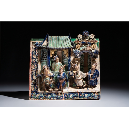 18 - A large and fine Chinese polychrome-glazed Shiwan stoneware group of immortals, 19th C.Dim.: 64,5 x ... 