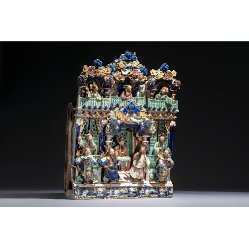 19 - A large and fine Chinese polychrome-glazed Shiwan stoneware group of immortals, 19th C.Dim.: 64,5 x ... 