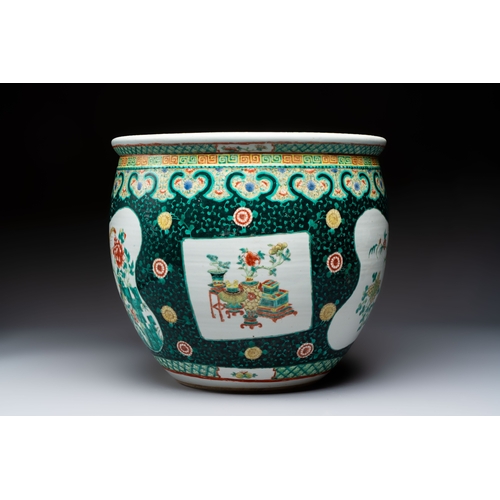 22 - A Chinese famille verte black-ground jardinière with birds, antiquities and flowers, 19th C.Dia.: 41... 