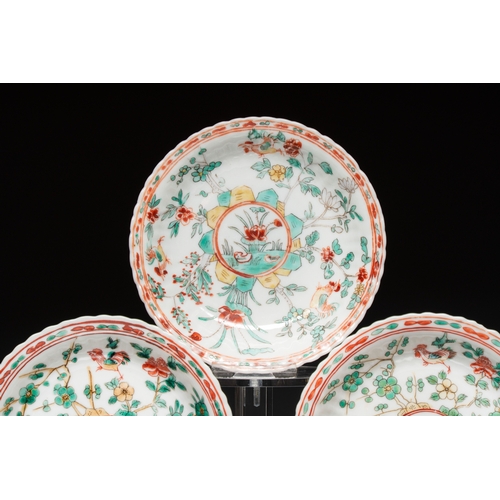 26 - Four Chinese famille verte cups and seven saucers, 19th C.Dia.: 12,5 cm (the saucers)Dia.: 7,9 cm - ... 