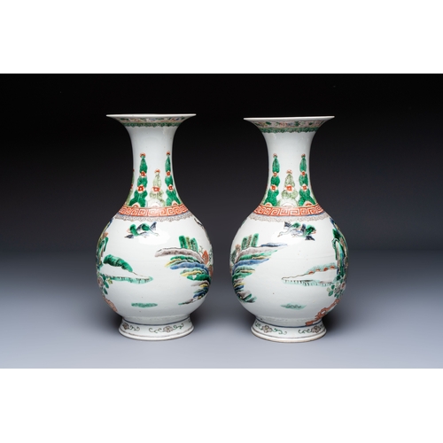 32 - A pair of Chinese famille verte vases with narrative design, 19th C.H.: 35 cmCondition reports and a... 