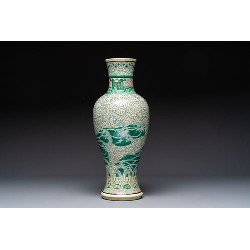 33 - A Chinese verte biscuit 'Dragon Gate Carp' vase on a wooden stand, Xuande mark, 19th C.H.: 63 cm (in... 
