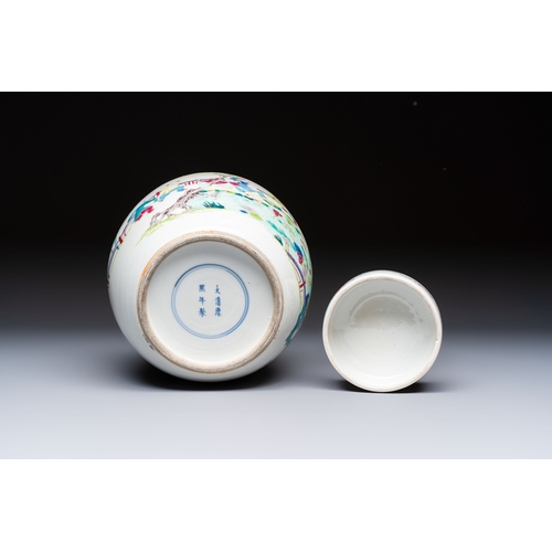37 - A Chinese famille rose 'Playing Boys' jar and cover, Kangxi mark, 19th C.H.: 23,5 cm (incl. cover)
C... 