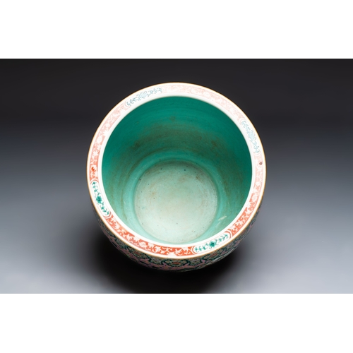 47 - A Chinese famille verte pink-ground scroll pot with narrative design, 19th C.Dia.: 41 cm - H.: 35,4 ... 