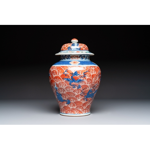 56 - A Chinese blue, white and iron-red decorated 'Mythical Animals' vase and cover, 19th C.H.: 35,5 cm (... 