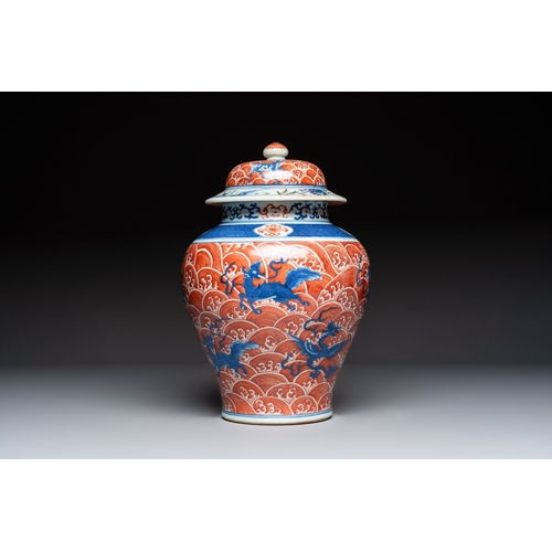 56 - A Chinese blue, white and iron-red decorated 'Mythical Animals' vase and cover, 19th C.H.: 35,5 cm (... 