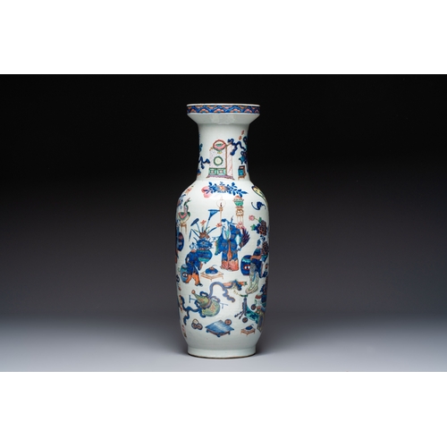 60 - A Chinese doucai and famille rose rouleau vase with figures among antiquities, 19th C.H.: 61,5 cm
Co... 