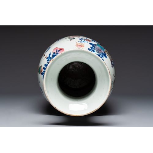 60 - A Chinese doucai and famille rose rouleau vase with figures among antiquities, 19th C.H.: 61,5 cm
Co... 