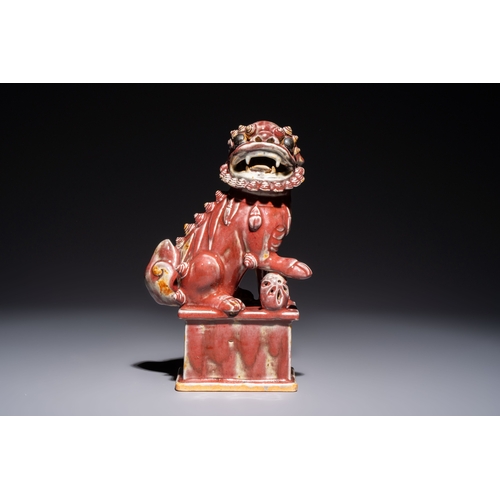 170 - A Chinese copper-red-glazed Buddhist lion, 19th C.H.: 27,5 cm
Condition reports and additional high-... 