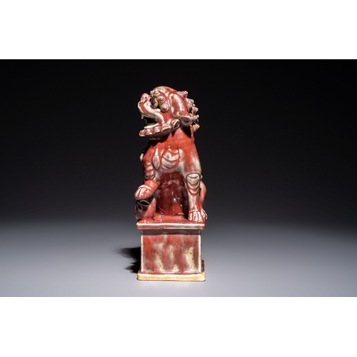 170 - A Chinese copper-red-glazed Buddhist lion, 19th C.H.: 27,5 cm
Condition reports and additional high-... 