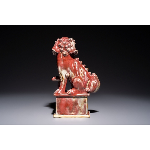 170 - A Chinese copper-red-glazed Buddhist lion, 19th C.H.: 27,5 cm
Condition reports and additional high-... 