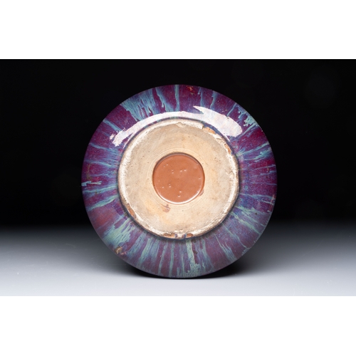 171 - A large Chinese flambé-glazed brush washer, 18th C.Dia.: 25 cm - H.: 6,5 cm
Condition reports and ad... 