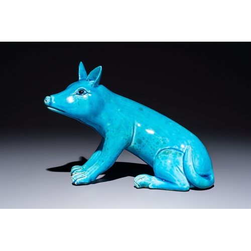 194 - A Chinese turquoise-glazed model of a dog, Qianlong mark, 19th C.L.: 19 cm - H.: 16 cm 
Condition re... 