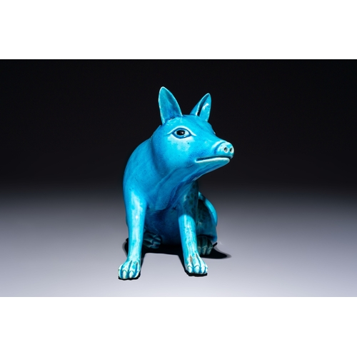 194 - A Chinese turquoise-glazed model of a dog, Qianlong mark, 19th C.L.: 19 cm - H.: 16 cm 
Condition re... 