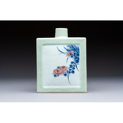 222 - A Chinese blue, white and copper-red celadon-ground tea caddy with floral and bamboo design, Qianlon... 