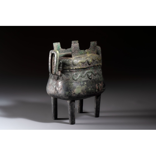 244 - An inscribed Chinese archaic bronze food vessel and cover with double-dragon design, 'Yu Fang Ding',... 