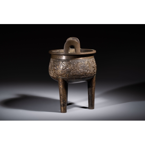 249 - A rare Chinese gold- and silver-inlaid bronze 'Ding' censer with Taotie design on a hongmu stand, Sh... 