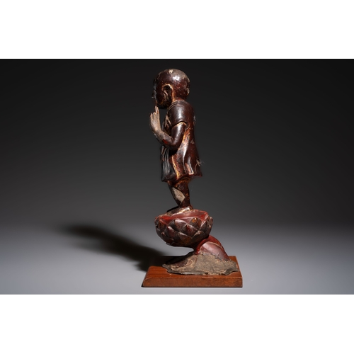 257 - A rare Chinese gilt-lacquered bronze Buddha standing on a lotus throne, MingH.: 46 cm (incl. stand)H... 